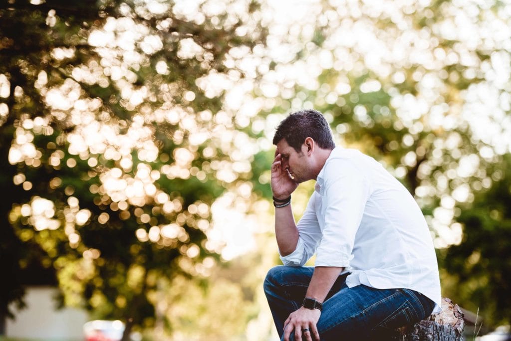 man sitting and thinking