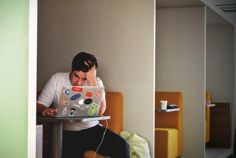 man under stress while working