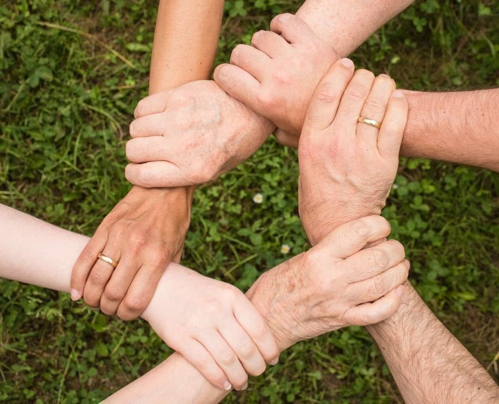 supporting others holding hands