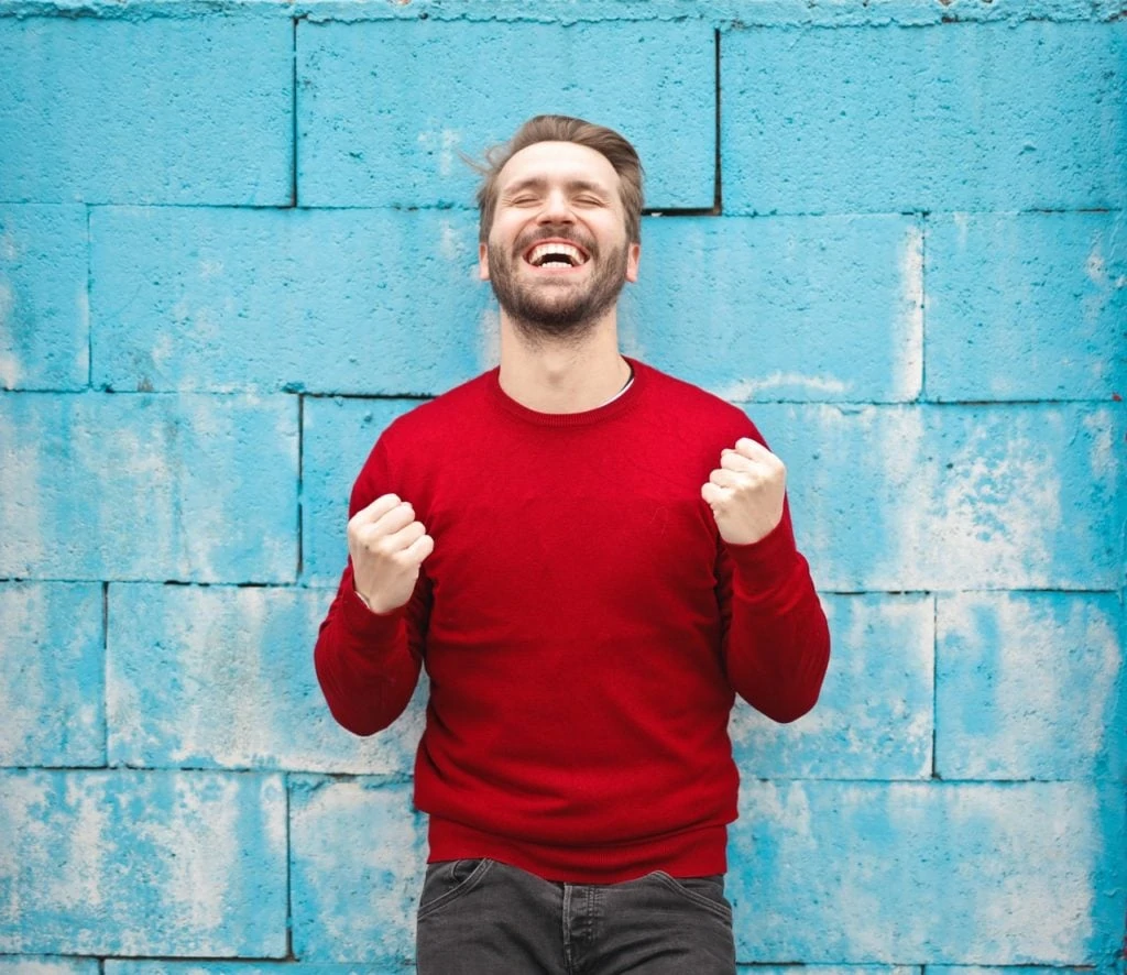 man cheering self esteem